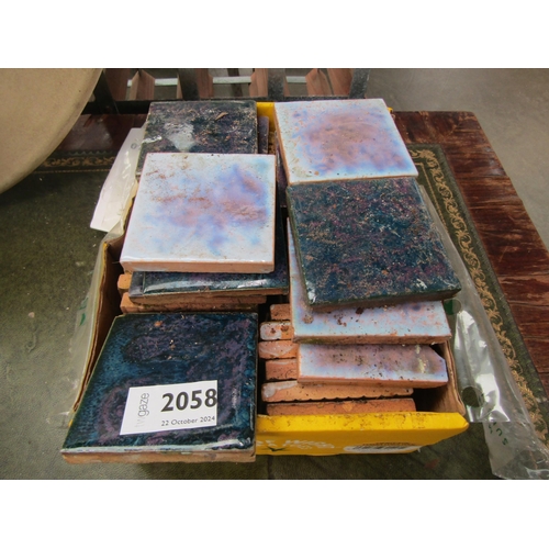 2058 - A box of glazed tiles,  25mm sq