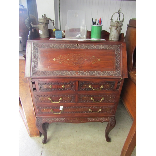 2100 - An Indian brass inlaid hardwood bureau with five drawers