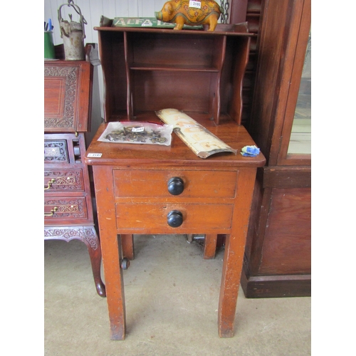 2107 - A small Victorian mahogany writing desk with two drawers