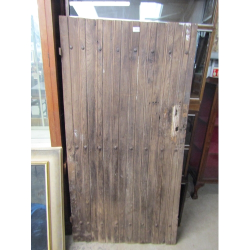 2112 - A 17th/18th Century oak door 79 x 156cm