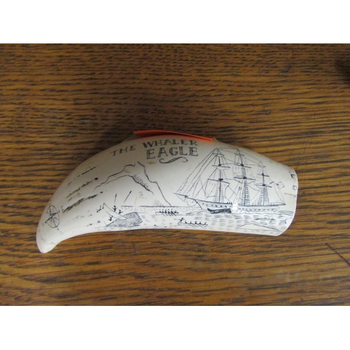 2127 - A worked resin scrimshaw whale tooth