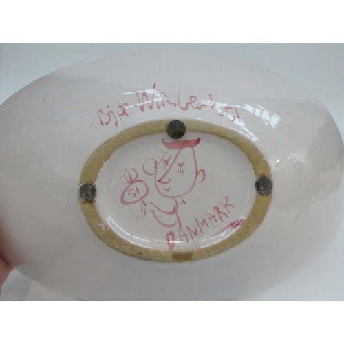 7191 - BJORN WIINBLAD (Danish 1918-2006) A pottery bowl, hand painted in pink.  Painted signature to base a... 