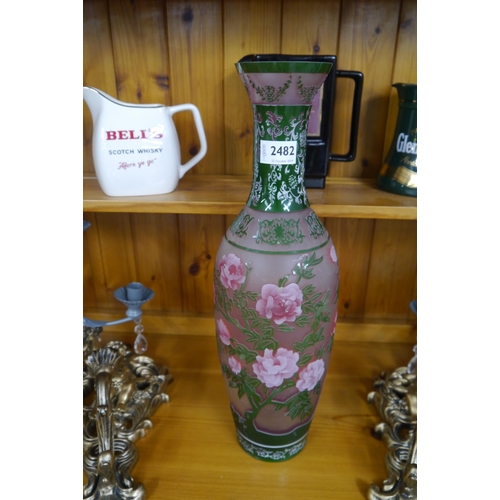 2482 - A floral overlayed glass vase