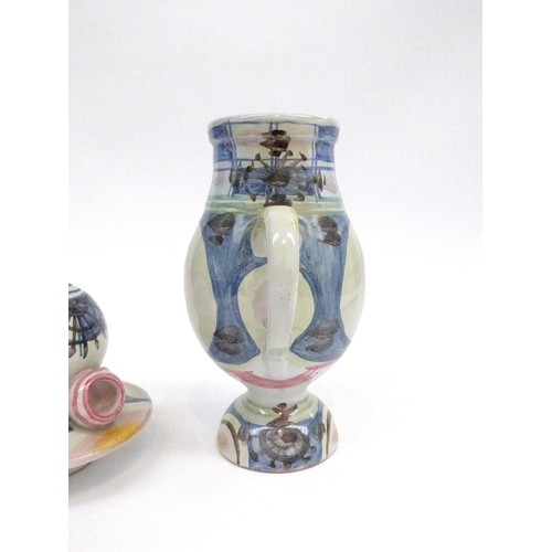 7207 - BJORN WIINBLAD (Danish 1918-2006) A pottery Lidded face jug. Painted marks to base, K 30, monogram a... 