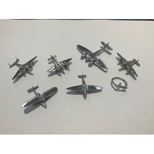 9535 - Six miniature handmade aircraft, one as a brooch and a ring