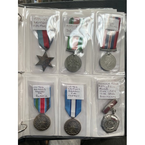 9551 - An album of mixed medals, mainly British WWI and WWII, including two WWI Victory medals to 112817 GN... 