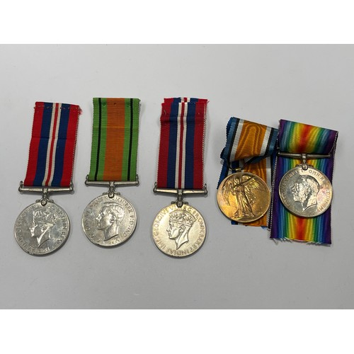 9458 - WITHDRAWN -A WWI pair of medals named to 30461 PTE. J.C. HILL LAN. FUS., together with a WWII Defenc... 