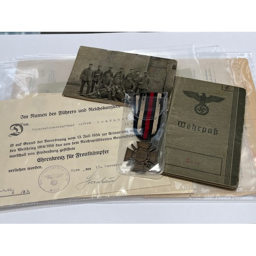 9490 - A WWI and WWII German medal group to ALFRED LANDAUSER with Cross of Honour and award document, Wehrp... 