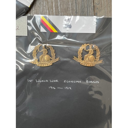 9488 - NORFOLK REGIMENT INTEREST: Eight various Norfolk Regiment cap badges: two variations of OTC Greshams... 