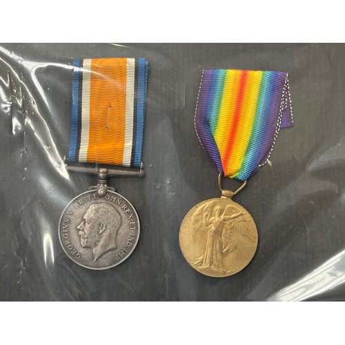 9498 - A WWI pair of medals named to 24090 PTE. C. SYMONDS NORF. R., together with a Victory medal named to... 