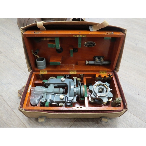 9239 - A cased Cooke, Troughton & Simms theodolite with canvas cover