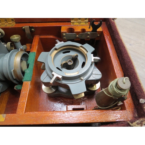 9239 - A cased Cooke, Troughton & Simms theodolite with canvas cover