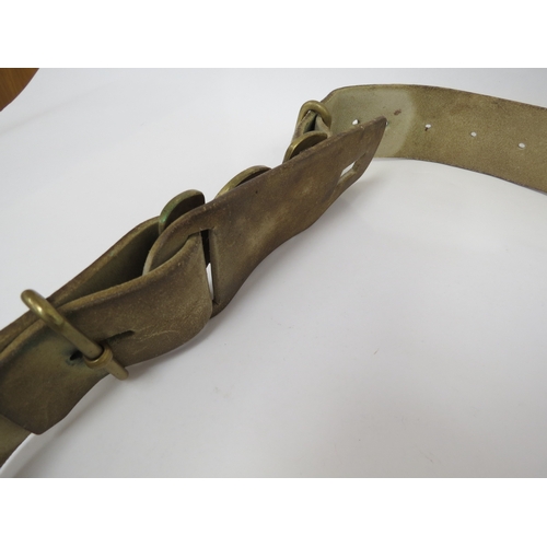 9244 - A Victorian British Army brass waist belt clasp on an original buff white leather belt