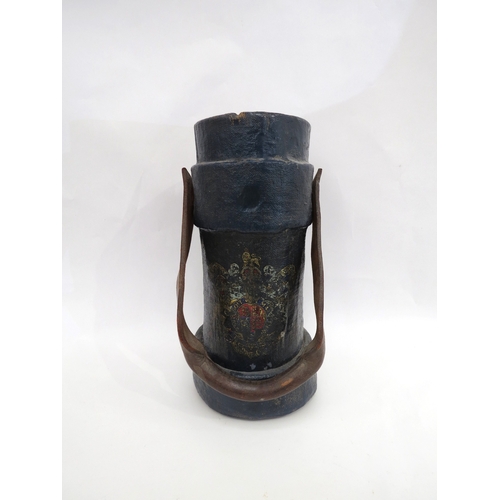 9268 - An early 20th Century shell carrier, with British coat of arms, painted in a dark blue, leather hand... 