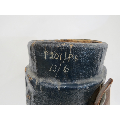 9268 - An early 20th Century shell carrier, with British coat of arms, painted in a dark blue, leather hand... 