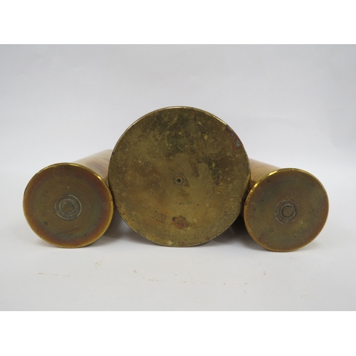 9270 - Two WWII 37mm shell cases marked M16, together with a WWI SP255 German shell case with 'trench art' ... 