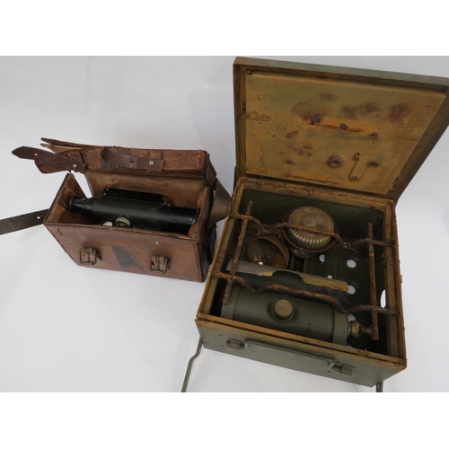 9278 - A leather cased theodolite by Watts & Son, together with a cased military stove (2)