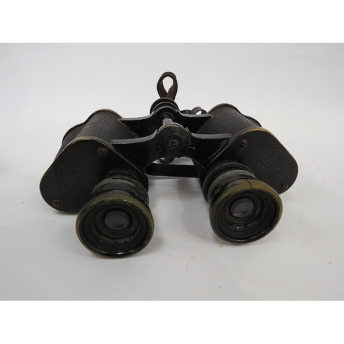 9279 - A pair of WWII German Goertz of Berlin binoculars with leather case