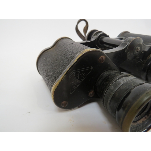 9279 - A pair of WWII German Goertz of Berlin binoculars with leather case