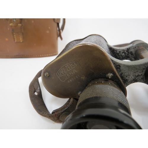 9284 - A pair of WWI era Imperial German binoculars by Zeiss, stamped with M (Marine) and crown, together w... 