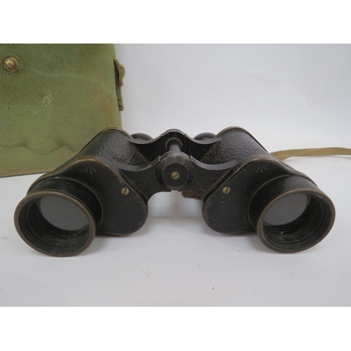 9285 - A pair of WWII 1942 dated Kershaw binoculars with webbing case