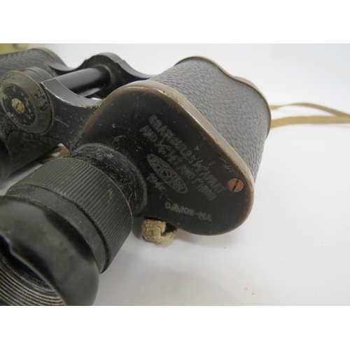 9285 - A pair of WWII 1942 dated Kershaw binoculars with webbing case