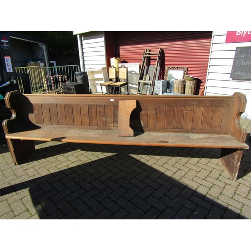 2002 - A Victorian oak pew 270cm long