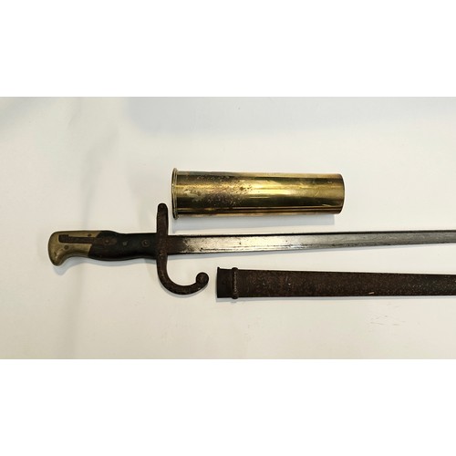 9337 - A NAAFI marked 1941 2pr No. 2 shell case together with a French Gras bayonet with scabbard (2)