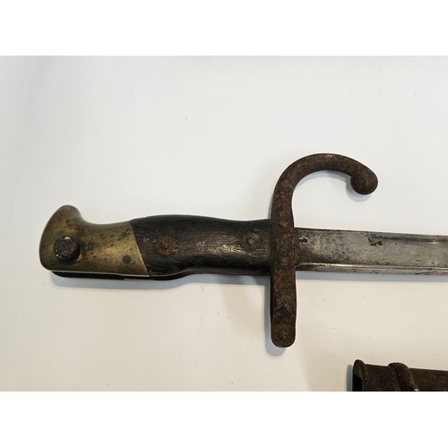 9337 - A NAAFI marked 1941 2pr No. 2 shell case together with a French Gras bayonet with scabbard (2)