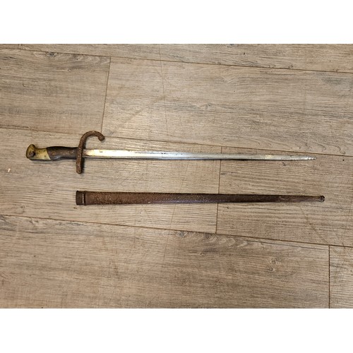 9337 - A NAAFI marked 1941 2pr No. 2 shell case together with a French Gras bayonet with scabbard (2)