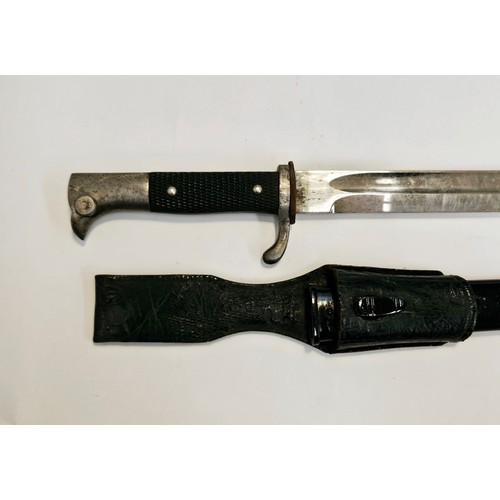 9340 - A WWII German K98 Police bayonet, the blade by Carl Eickhorn, Solingen, black grips, leather frog an... 