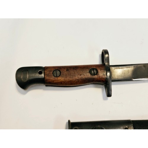 9348 - A WWII Indian made Mk. II bayonet with NWR 43 stamp to ricasso, with scabbard