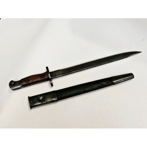 9348 - A WWII Indian made Mk. II bayonet with NWR 43 stamp to ricasso, with scabbard