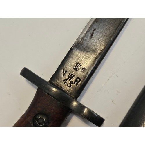 9348 - A WWII Indian made Mk. II bayonet with NWR 43 stamp to ricasso, with scabbard