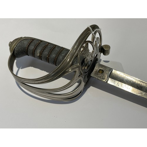 9407 - A Victorian Rifle / Light Infantry Officer’s sword, shagreen grip, pierced basket with bugle and Vic... 