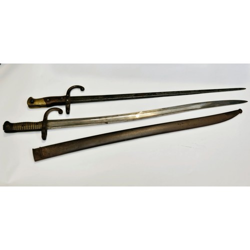 9349 - A 19th Century French Chassepot sabre bayonet with scabbard together with a Gras bayonet, no scabbar... 