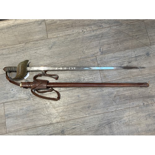 9405 - A George V 1897 pattern officer's sword, pierced basket hilt with cypher and wired shagreen grip joi... 