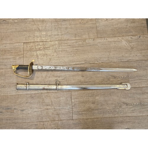 9353 - A reproduction reenactor's US Model 1850 Union style officer's sword with associated steel scabbard,... 