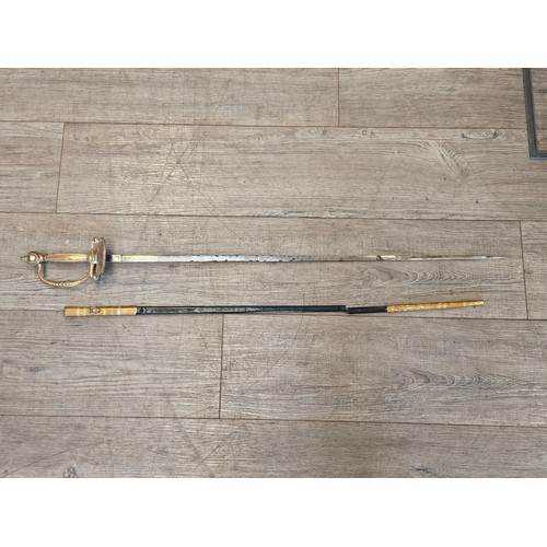 9360 - A George V court dress sword, brass hilt with D-form knucklebow and shell-form guard, joining an eng... 