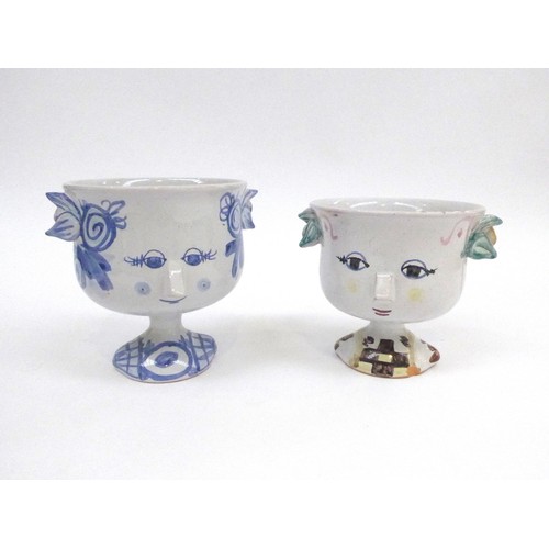 7216 - BJORN WIINBLAD (Danish 1918-2006)  Two pottery lidded face jars.  Hand painted detail, one blue, one... 