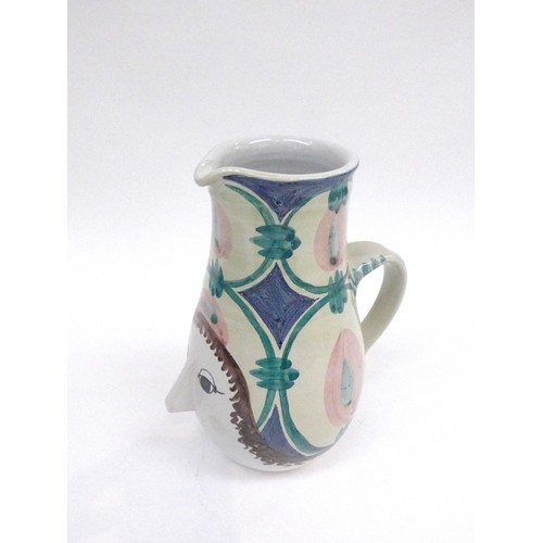 7206 - BJORN WIINBLAD (Danish 1918-2006) An earthenware face jug and cover hand painted in colours.  Painte... 