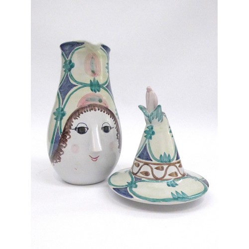 7206 - BJORN WIINBLAD (Danish 1918-2006) An earthenware face jug and cover hand painted in colours.  Painte... 