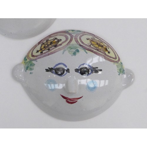 7195 - BJORN WIINBLAD (Danish 1918-2006) Five pottery face mask wall plaques, hand painted in colours.  Pai... 