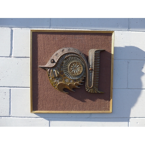 7580 - A Giovanni Schoemann (1940-1981) bronzed resin wall plaque as a stylised fish with moulded motif dec... 