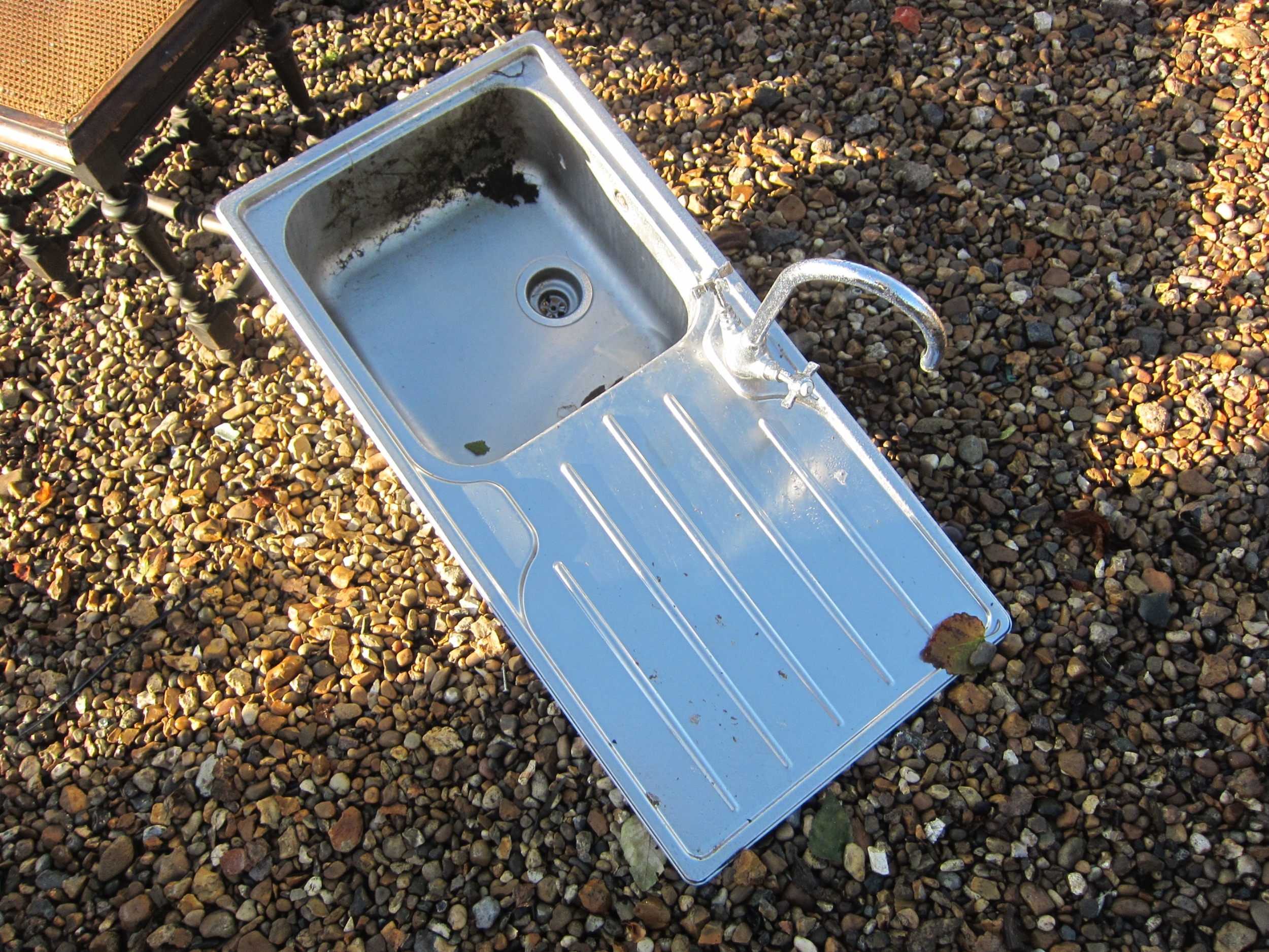 A Carron Phoenix inset stainless steel sink with drainer and tap