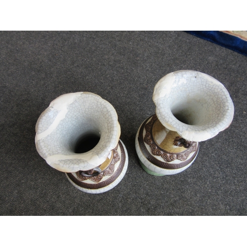 1111 - A pair of Chinese lion mask handled vases, A/F extensive repairs to rims and base, brown square char... 