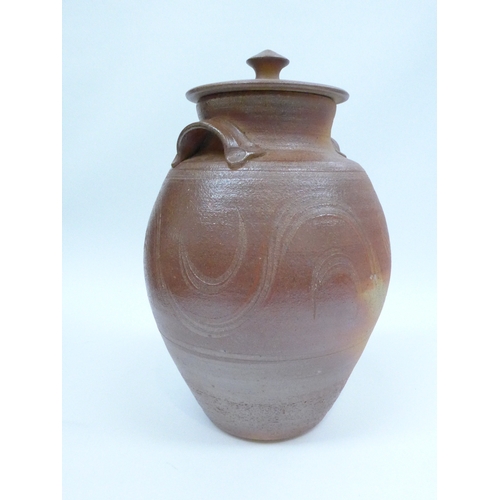 7102 - An Appin Pottery large lidded jar with finger wipe decoration.  Impressed pottery seal and 