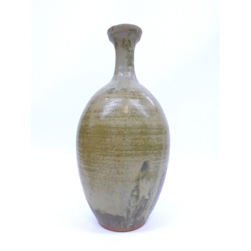 7083 - VERA TOLLOW (b. 1931): A large Studio pottery bottle vase with ash glaze.  Painted 