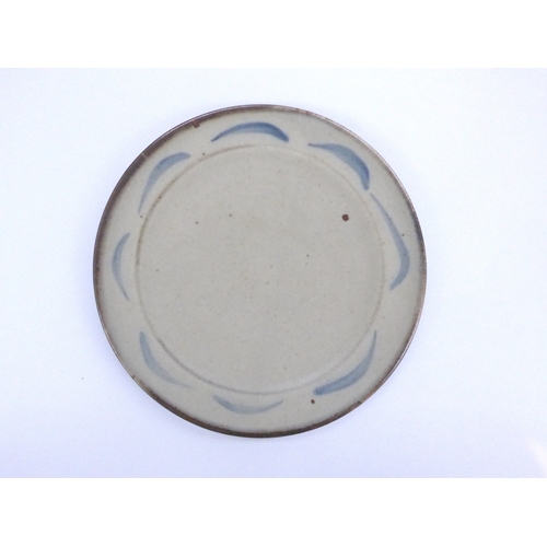 7118 - BERNARD LEACH (1887-1979): A St Ives pottery side plate, with painted blue dash decoration.  Painted... 