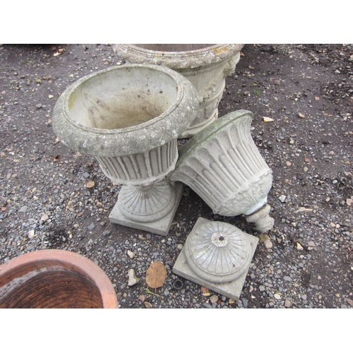 3453 - A pair of composition urns, a/f